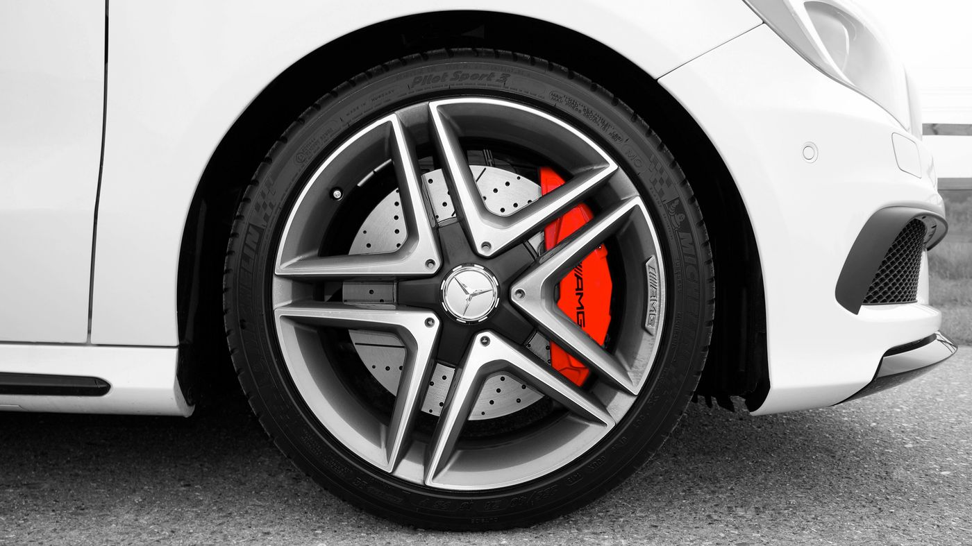 Polished alloy wheel and tire after detailing