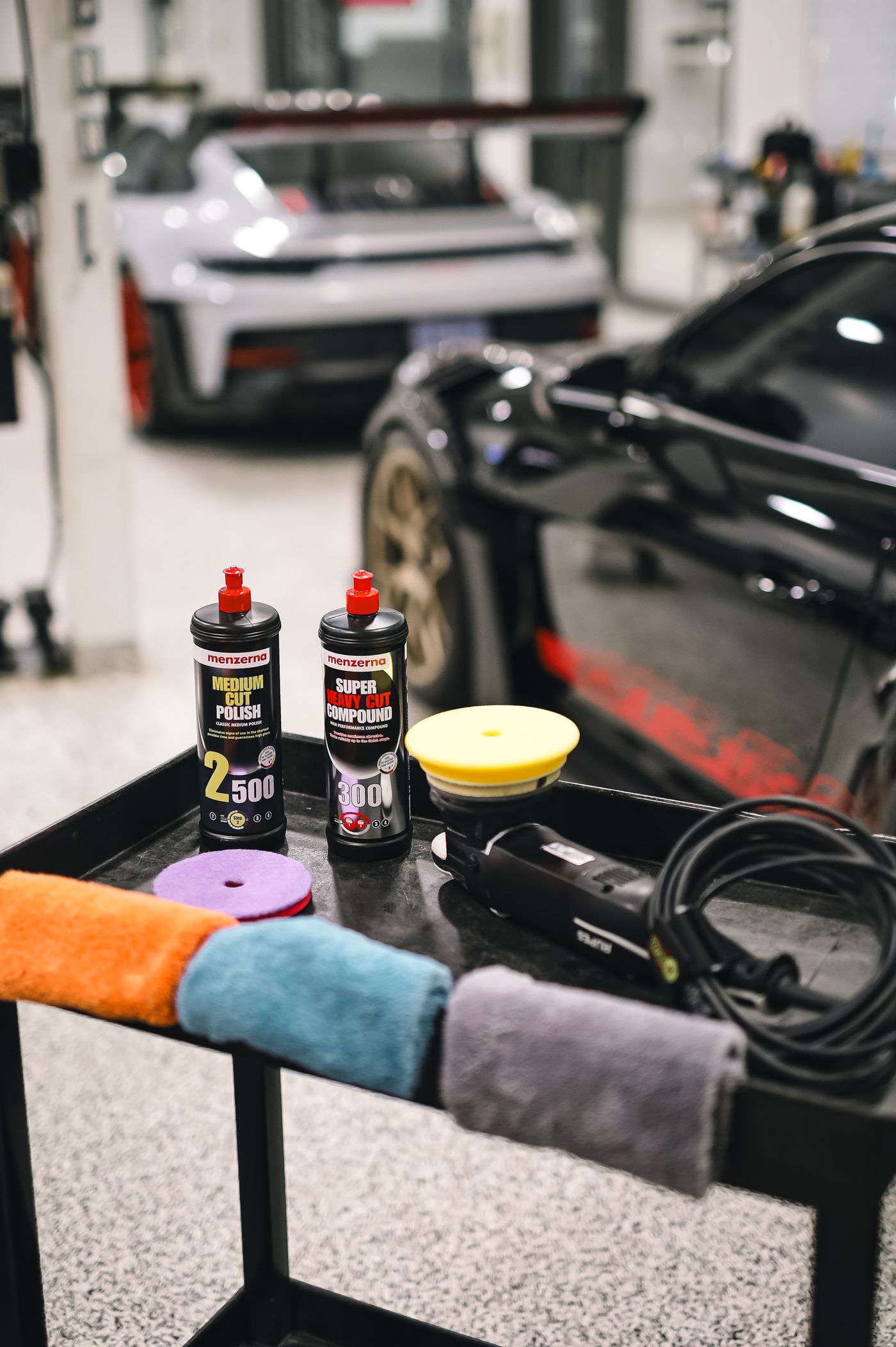 Detailer arriving with a fully equipped mobile setup to begin a job